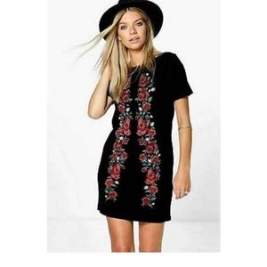 Black dress with flowers in the front by boohoo size 6 women's